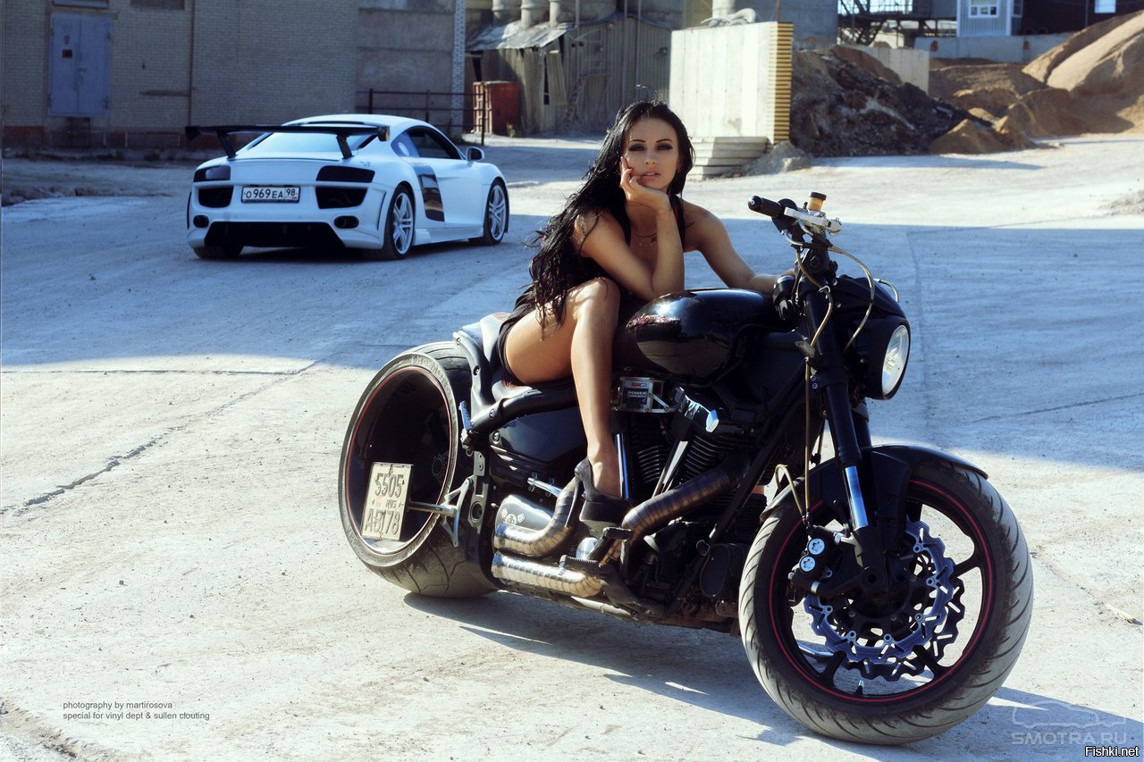 Sexy model Brunettes on a motorcycle in Duning