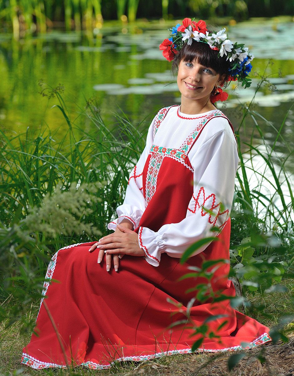 Beautiful girl Girls in Slavic costumes in Duning